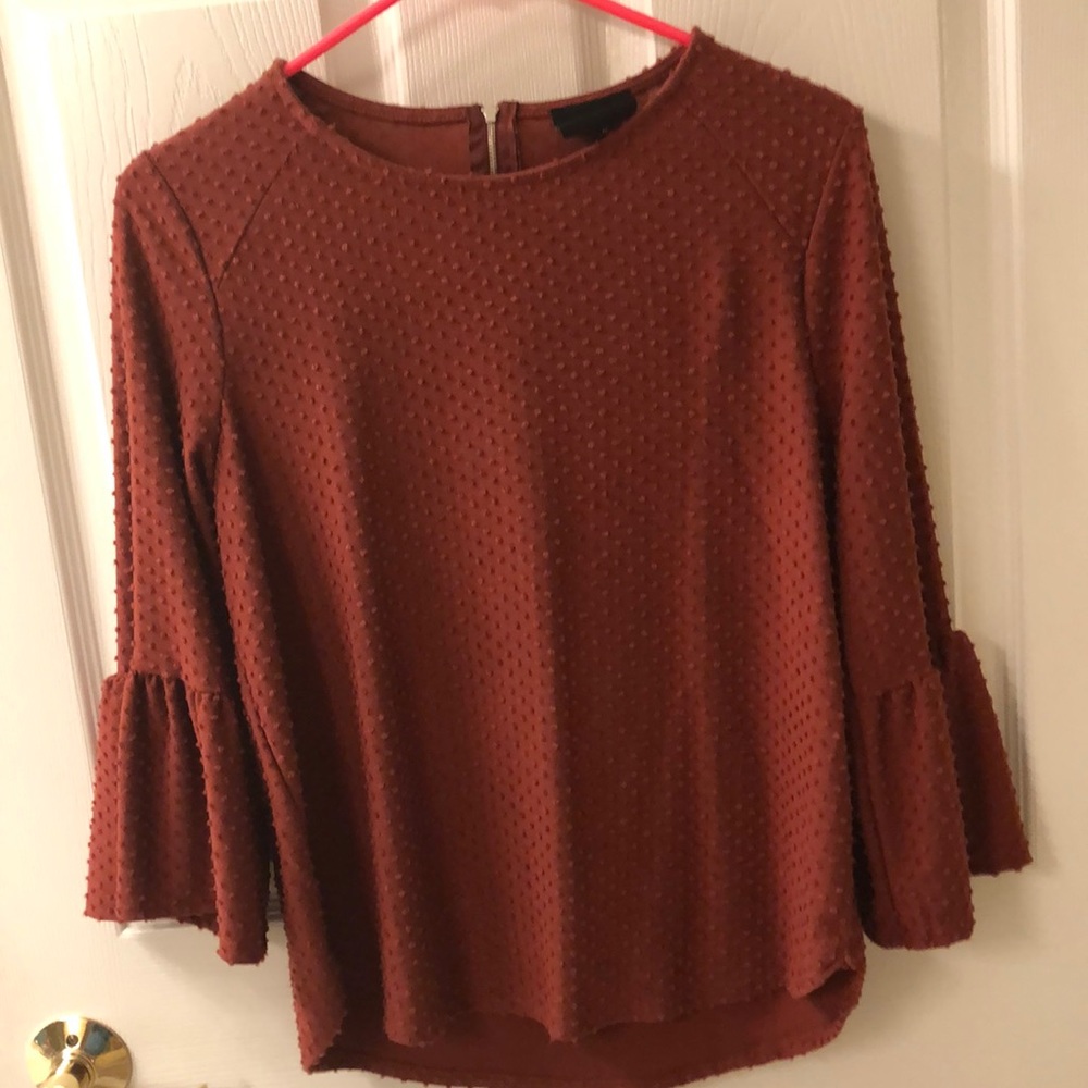 Cute rusty colored top for autumn or spring!